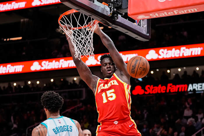 Clint Capela dunks the ball.