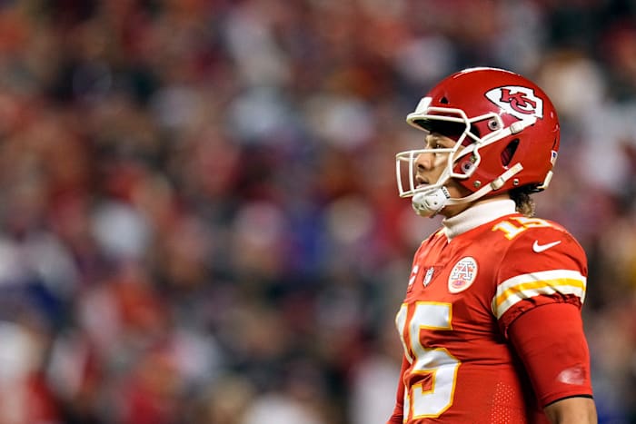 Jan 23, 2022; Kansas City, Missouri, USA; Kansas City Chiefs quarterback Patrick Mahomes (15) looks down the field against the Buffalo Bills during the first half in the AFC Divisional playoff football game at GEHA Field at Arrowhead Stadium. Mandatory Credit: Jay Biggerstaff-USA TODAY Sports