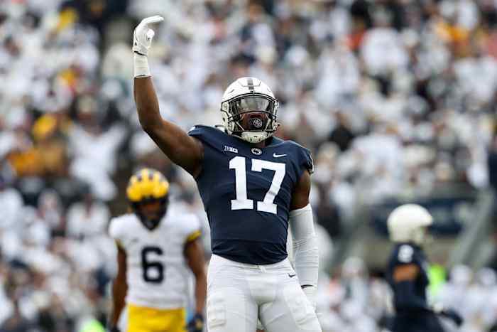 Penn State DE Arnold Ebiketie celebrates sack