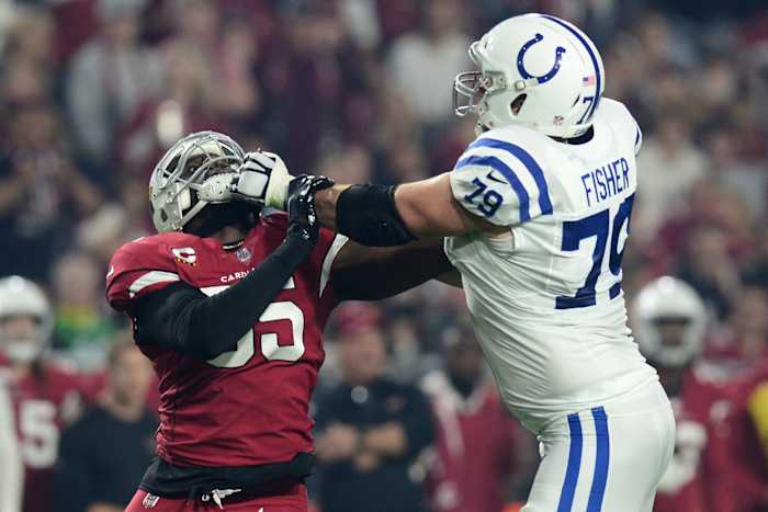 Dec 25, 2021; Glendale, Arizona, USA; Indianapolis Colts offensive tackle Eric Fisher (79) blocks Arizona Cardinals outside linebacker Chandler Jones (55) during the first half at State Farm Stadium. Mandatory Credit: Joe Camporeale-USA TODAY Sports