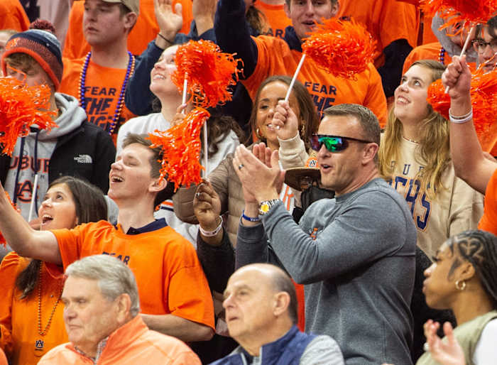 Auburn football head coach Bryan Harsin joins the students section as Auburn Tigers men's basketball takes on Kentucky Wildcats at Auburn Arena on Saturday, Jan. 22, 2022. Auburn Tigers defeated Kentucky Wildcats 80-71.