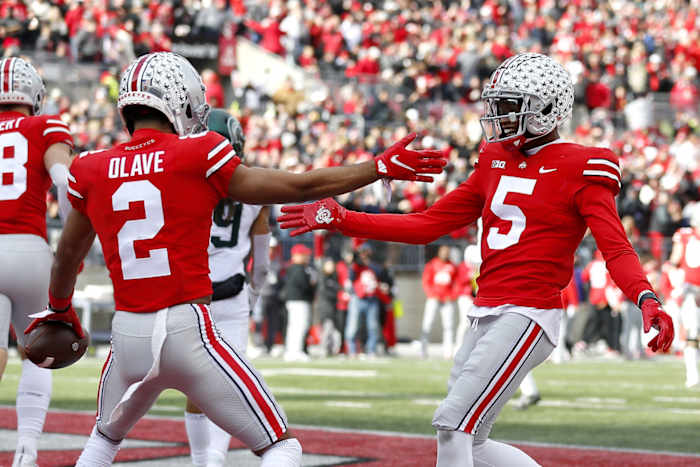 Ohio State wide receivers Chris Olave and Garrett Wilson celebrate touchdown