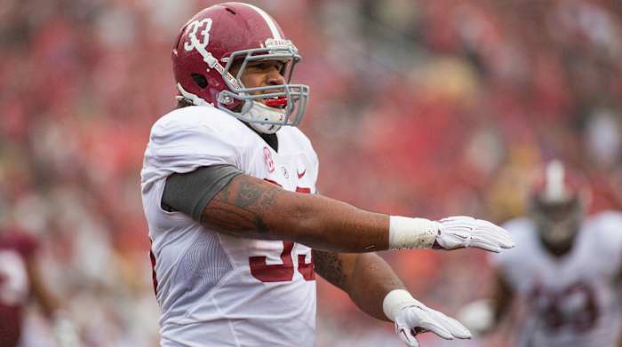 Oct 11, 2014; Fayetteville, AR, USA; Alabama Crimson Tide linebacker Trey DePriest (33) reacts to a call during a game against the Arkansas Razorbacks at Donald W. Reynolds Razorback Stadium. Alabama defeated Arkansas 14-13.
