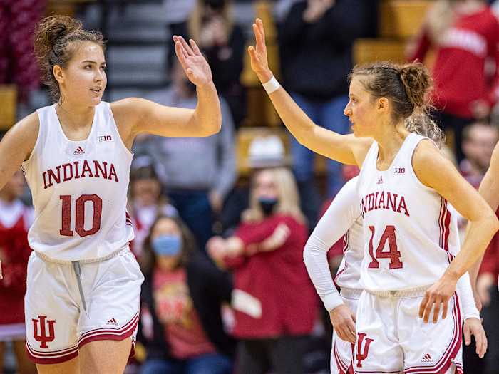 Indiana's Aleksa Gulbe and guard Ali Patberg high five