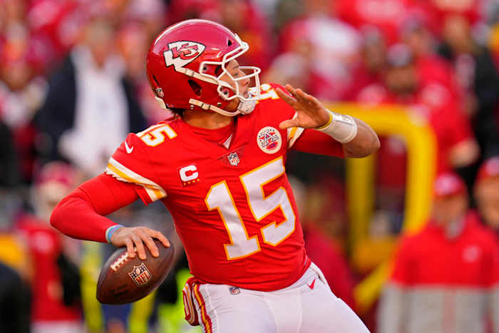 Jan 30, 2022; Kansas City, Missouri, USA; Kansas City Chiefs quarterback Patrick Mahomes (15) passes the ball against the Cincinnati Bengals during the second quarter of the AFC Championship Game at GEHA Field at Arrowhead Stadium. Mandatory Credit: Jay Biggerstaff-USA TODAY Sports