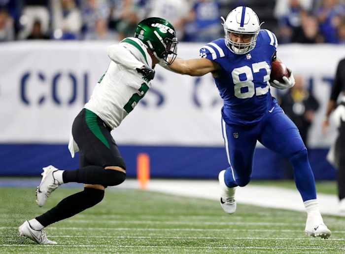 Indianapolis Colts tight end Kylen Granson (83) tries to fight off New York Jets safety Ashtyn Davis (21) as he advances the ball 27 yards Thursday, Nov. 4, 2021, during a game against the New York Jets at Lucas Oil Stadium in Indianapolis.