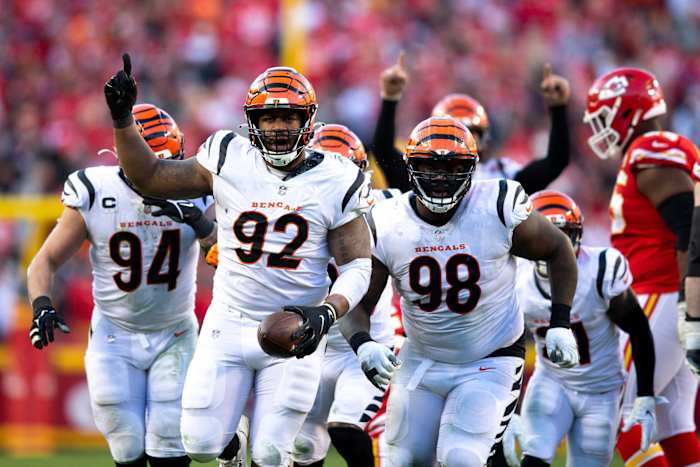 Bengals defensive end B.J. Hill (92) celebrates after intercepting a pass from Chiefs quarterback Patrick Mahomes in the fourth quarter. Syndication The Enquirer