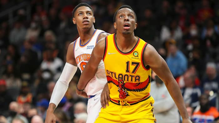 Atlanta Hawks forward Onyeka Okongwu (17) boxes out New York Knicks guard RJ Barrett.