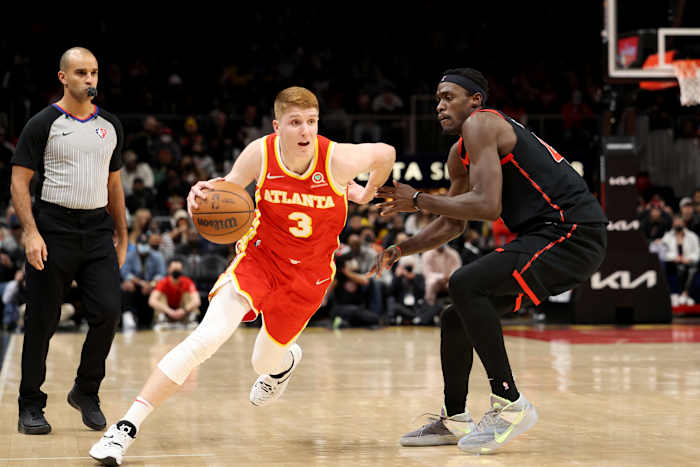 Jan 31, 2022; Atlanta, Georgia, USA; Atlanta Hawks guard Kevin Huerter (3) drives against Toronto Raptors forward Pascal Siakam (43) during the second half at State Farm Arena.