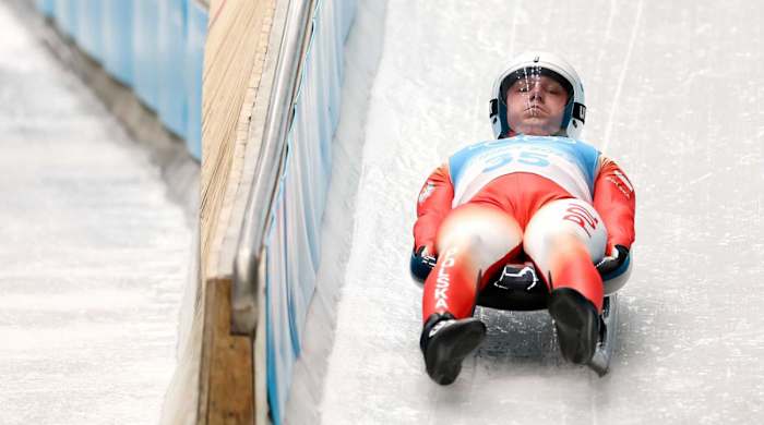 Mateusz Sochowicz of Poland competes in men’s luge at the Beijing Olympics.