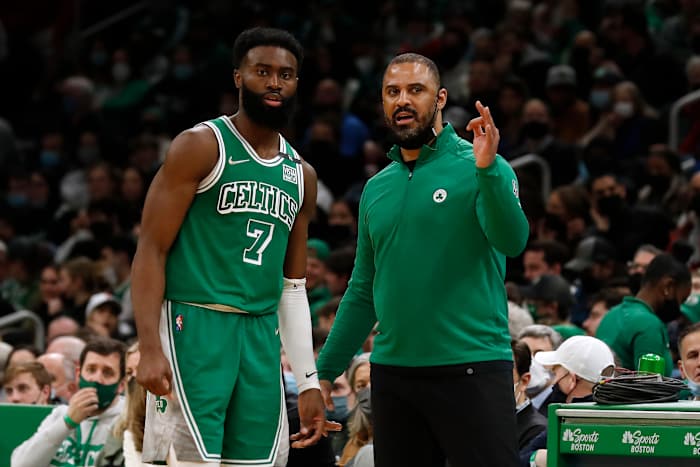 Jan 31, 2022; Boston, Massachusetts, USA; Boston Celtics head coach Ime Udoka talks with guard Jaylen Brown (7) during the second half against the Miami Heat at TD Garden