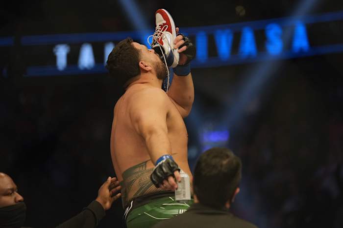 Tai Tuivasa celebrates a victory with his signature "shoey." 