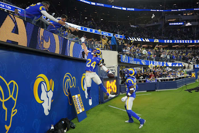 Dec 21, 2021; Inglewood, California, USA; Los Angeles Rams free safety Taylor Rapp (24) celebrates with fans after intercepting a pass against the Seattle Seahawks in the second half at SoFi Stadium. The Rams defeated the Seahawks 20-10. Mandatory Credit: Kirby Lee-USA TODAY Sports