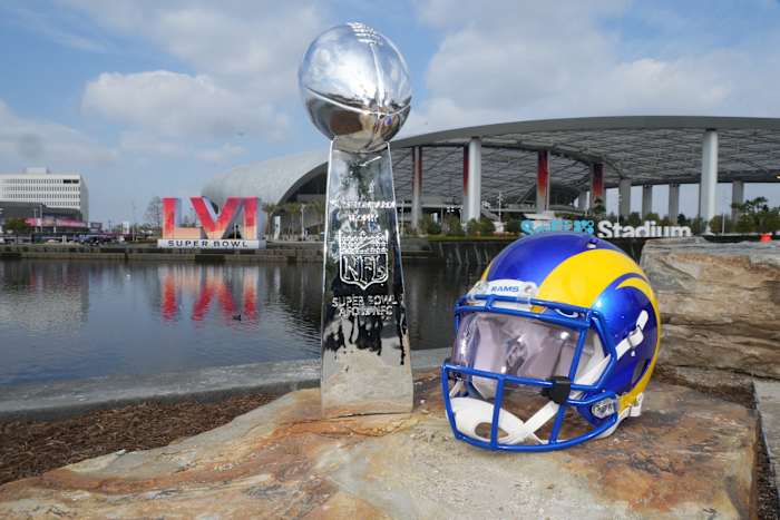 Feb 1, 2022; Inglewood, CA, USA; A Los Angeles Rams helmet and Vince Lombardi trophy are seen at SoFi Stadium. The Rams will play the Cincinnati Bengals in Super Bowl LVI on Feb. 13, 2022. Mandatory Credit: Kirby Lee-USA TODAY