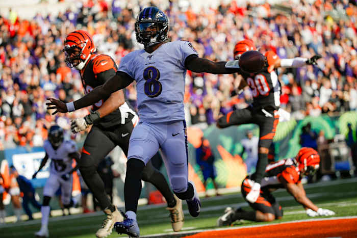 Lamar Jackson scores a touchdown against the Bengals.