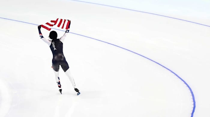 Erin Jackson of Team USA celebrates after winning gold in women’s 500m speed skating.
