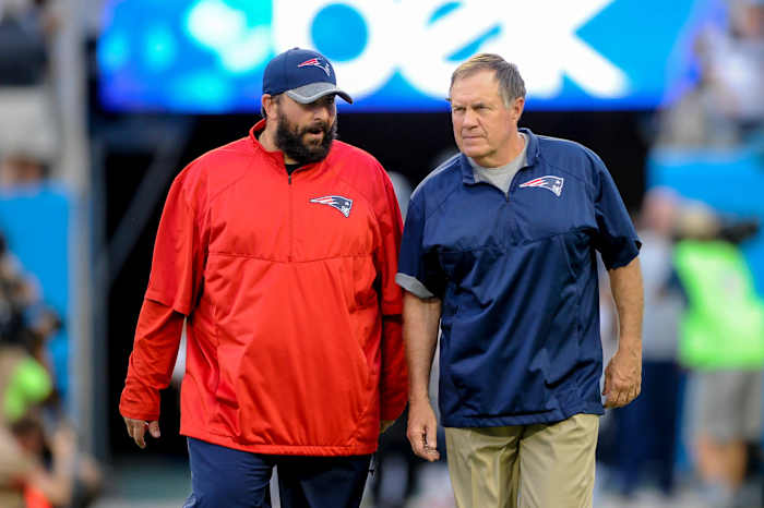 Patriots’ Coaches Matt Patricia (left), Bill Belichick