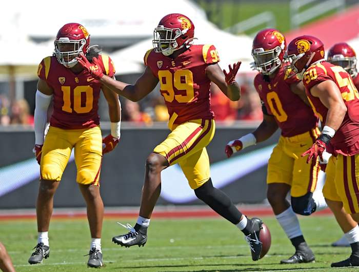 USC linebacker Drake Jackson celebrates interception
