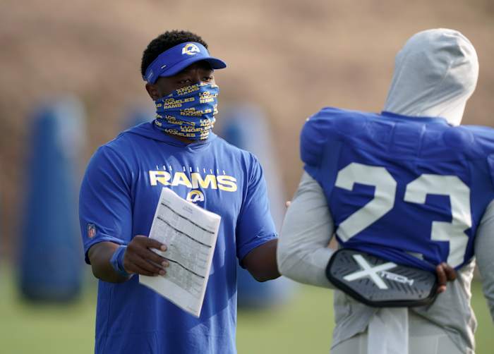 Aug 21, 2020; Thousand Oaks, CA, USA; Los Angeles Rams running back Thomas Brown (left) talks with running back Cam AKers (23) during training camp at Cal Lutheran University. Mandatory Credit: Kirby Lee-USA TODAY Sports