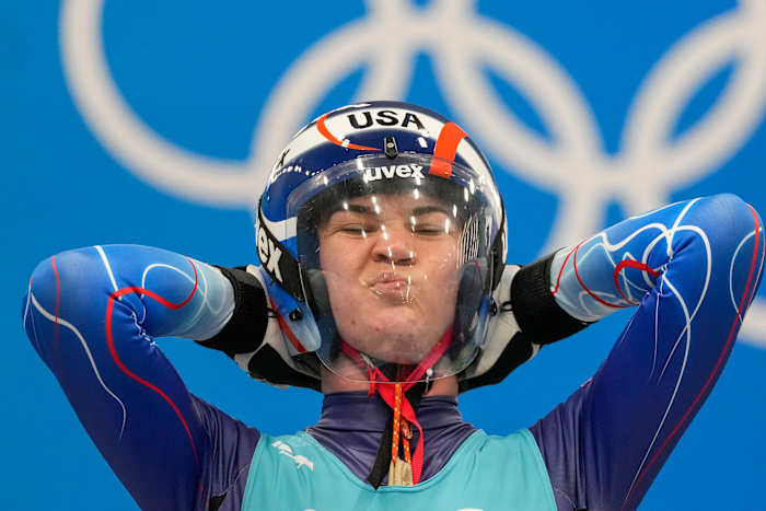 Before a race, Britcher counts down the time until she will feel warm again.