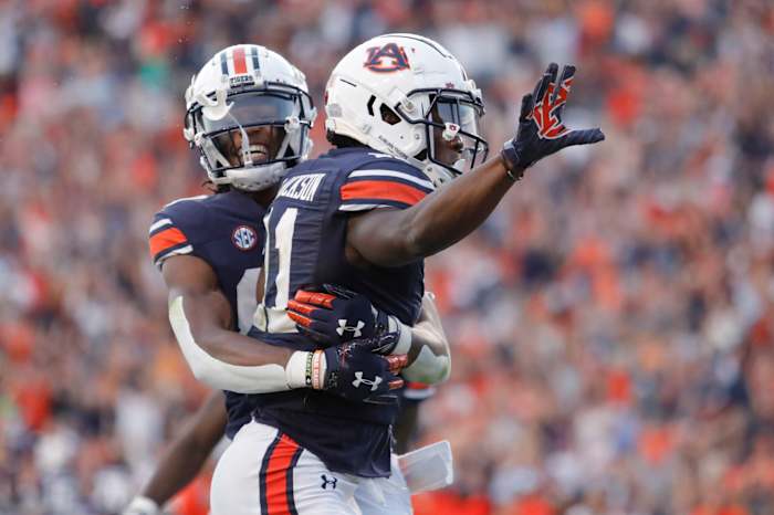 Sep 25, 2021; Auburn, Alabama, USA; Auburn Tigers receiver Shedrick Jackson (11) celebrates with receiver Ze'Vian Capers (80) after scoring a touchdown late in the fourth quarter against the Georgia State Panthers at Jordan-Hare Stadium. Mandatory Credit: John Reed-USA TODAY Sports