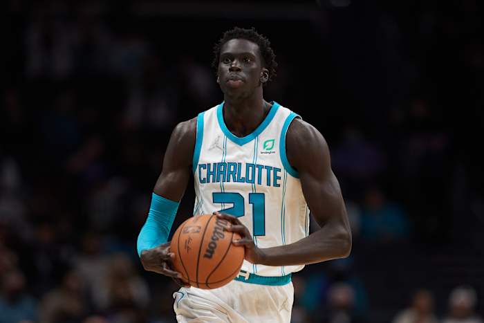 Jan 5, 2022; Charlotte, North Carolina, USA; Charlotte Hornets forward JT Thor (21) brings the ball up the court during fourth quarter action against the Detroit Pistons at Spectrum Center. Mandatory Credit: Brian Westerholt-USA TODAY Sports