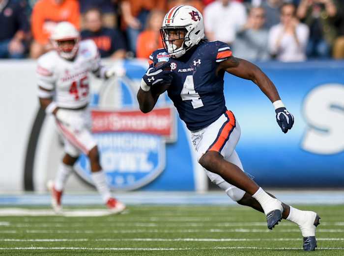Auburn Tigers running back Tank Bigsby (4) breaks free for a big gainer against Houston during the Birmingham Bowl at Protective Stadium in Birmingham, Ala., on Tuesday December 28, 2021. Bham03
