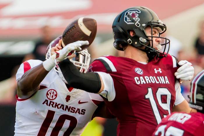 South Carolina Gamecocks quarterback Jake Bentley (19) fumbles while being hit by South Carolina Gamecocks linebacker Skai Moore (10) in the first half at Williams-Brice Stadium. Bentley recovered the fumble.