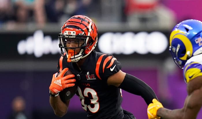 Feb 13, 2022; Inglewood, CA, USA; Cincinnati Bengals wide receiver Tyler Boyd (83) runs past Los Angeles Rams outside linebacker Leonard Floyd (54) in the first quarter during Super Bowl 56, Sunday, Feb. 13, 2022, at SoFi Stadium in Inglewood, Calif. Mandatory Credit: Sam Greene-USA TODAY Sports