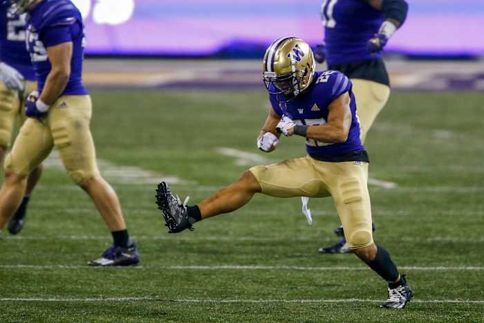 Nov 28, 2020; Seattle, Washington, USA; Washington Huskies defensive back Trent McDuffie (22) reacts following a turnover on downs against the Utah Utes during the third quarter at Alaska Airlines Field at Husky Stadium. Mandatory Credit: Joe Nicholson-USA TODAY Sports
