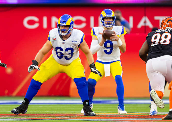 Feb 13, 2022; Inglewood, CA, USA; Los Angeles Rams center Austin Corbett (63) blocks for quarterback Matthew Stafford (9) against the Cincinnati Bengals in Super Bowl LVI at SoFi Stadium. Mandatory Credit: Mark J. Rebilas-USA TODAY Sports