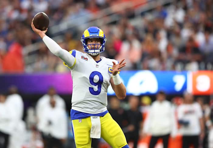 Feb 13, 2022; Inglewood, CA, USA; Los Angeles Rams quarterback Matthew Stafford (9) throws a touchdown pass to wide receiver Cooper Kupp (not pictured) against the Cincinnati Bengals during the second quarter in Super Bowl LVI at SoFi Stadium. Mandatory Credit: Mark J. Rebilas-USA TODAY Sports