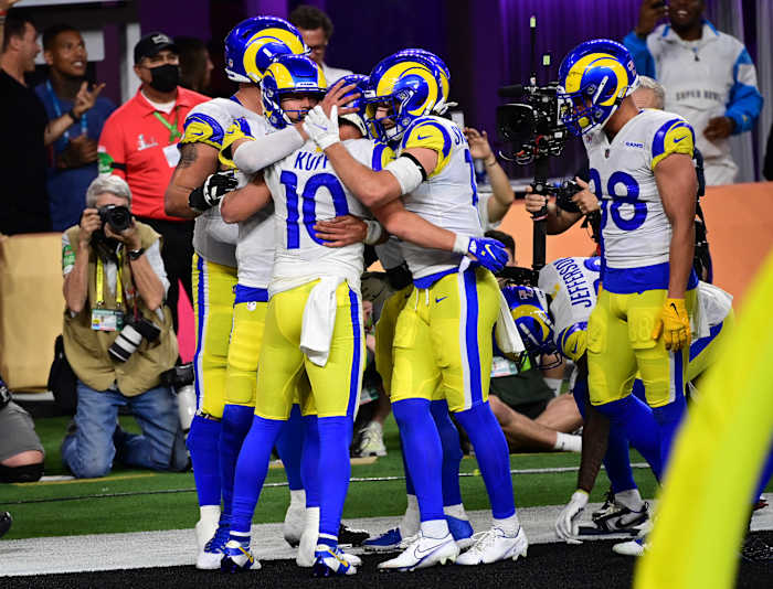 Feb 13, 2022; Inglewood, California, USA; Los Angeles Rams quarterback Matthew Stafford (9) celebrates with receiver Cooper Kupp (10) after scoring a touchdown in the fourth quarter against the Cincinnati Bengals in Super Bowl LVI at SoFi Stadium. Mandatory Credit: Gary A. Vasquez-USA TODAY Sports