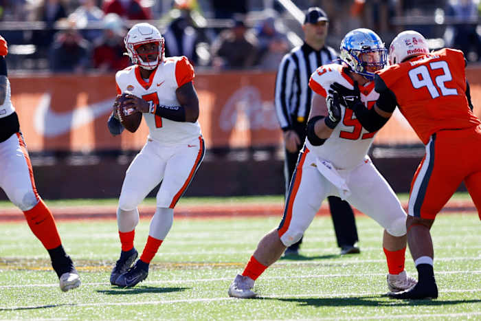 Liberty QB Malik Willis drops back to pass in Senior Bowl