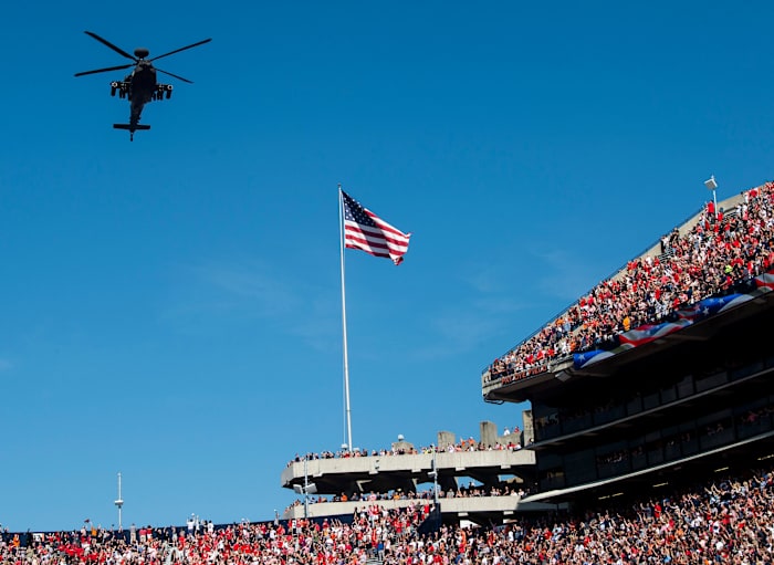 A helicopter flies over before the game at Jordan-Hare Stadium in Auburn, Ala., on Saturday, Oct. 9, 2021. Georgia Bulldogs lead the Auburn Tigers 17-3 at halftime.