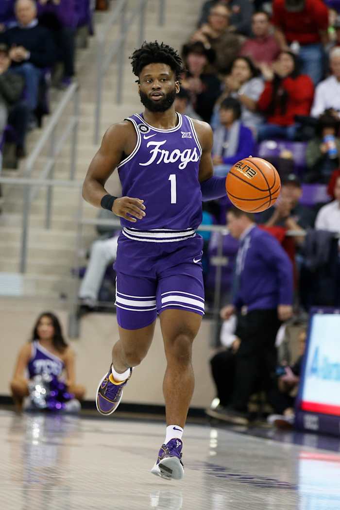 Feb 26, 2022; Fort Worth, Texas, USA; TCU Horned Frogs guard Mike Miles (1) dribbles up court in the first half against the Texas Tech Red Raiders at Ed and Rae Schollmaier Arena. Mandatory Credit: Tim Heitman-USA TODAY Sports