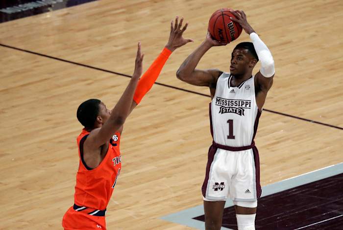Mar 2, 2022; Starkville, Mississippi, USA; Mississippi State Bulldogs guard Iverson Molinar (1) attempts a three-point shot as Auburn Tigers forward Jabari Smith (10) defends during the first half at Humphrey Coliseum. Mandatory Credit: Petre Thomas-USA TODAY Sports