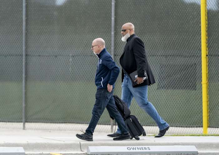 March 1, 2022; Jupiter, FL, USA; Major League Baseball Players Association executive director Tony Clark, right, and chief negotiator Bruce Meyer arrive for negotiations with the players union in an attempt to reach an agreement to salvage March 31 openers and a 162-game season, March 1, 2022, at Roger Dean Stadium in Jupiter, Florida. Mandatory Credit: Greg Lovett-USA TODAY NETWORK