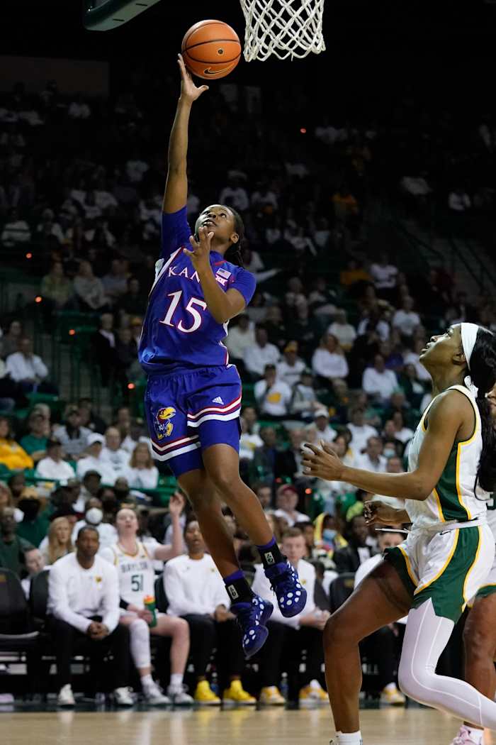 Feb 26, 2022; Waco, Texas, USA; Kansas Jayhawks guard Zakiyah Franklin (15) scores a layup against the Baylor Lady Bears during the first half at Ferrell Center. Mandatory Credit: Chris Jones-USA TODAY Sports