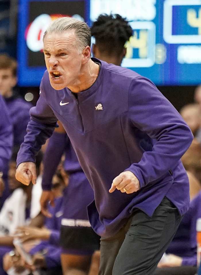 Mar 3, 2022; Lawrence, Kansas, USA; TCU Horned Frogs head coach Jamie Dixon reacts to play against the Kansas Jayhawks during the second half at Allen Fieldhouse. Mandatory Credit: Denny Medley-USA TODAY Sports