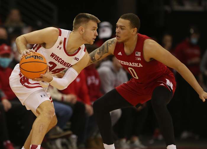 Brad Davison and CJ Welcher MBB vs Wisconsin 2022.03.06 USATSI_17844498