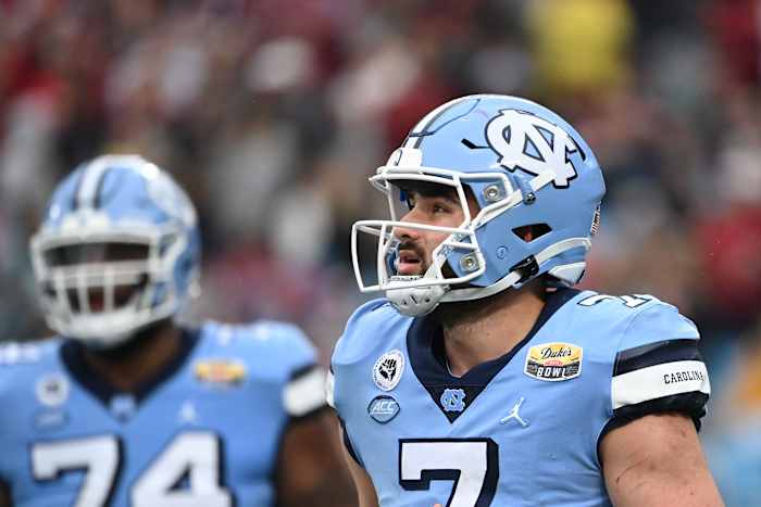 Dec 30, 2021; Charlotte, NC, USA; North Carolina Tar Heels quarterback Sam Howell (7) on the field in the third quarter during the 2021 Duke's Mayo Bowl at Bank of America Stadium. Mandatory Credit: Bob Donnan-USA TODAY Sports