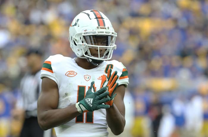 Oct 30, 2021; Pittsburgh, Pennsylvania, USA; Miami Hurricanes wide receiver Charleston Rambo (11) gestures at the line of scrimmage against the Pittsburgh Panthers during the fourth quarter at Heinz Field. Mandatory Credit: Charles LeClaire-USA TODAY Sports