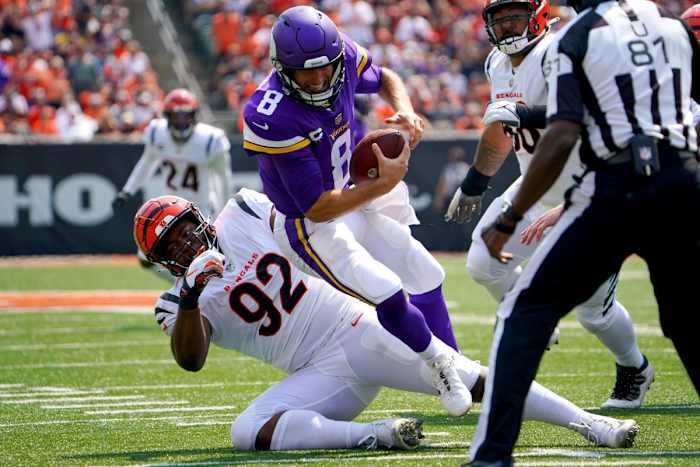 Cincinnati Bengals DT B.J. Hill (92) sacks Minnesota Vikings quarterback Kirk Cousins (8) © Kareem Elgazzar via Imagn Content Services, LLC