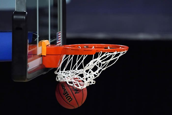 Mar 5, 2021; Las Vegas, NV, USA; A general view of a Wilson NCAA official basketball and rim and net during a Pac-12 Conference women's tournament semifinal between the Arizona Wildcats and the UCLA Bruins at Mandalay Bay Events Center. Mandatory Credit: Kirby Lee-USA TODAY Sports