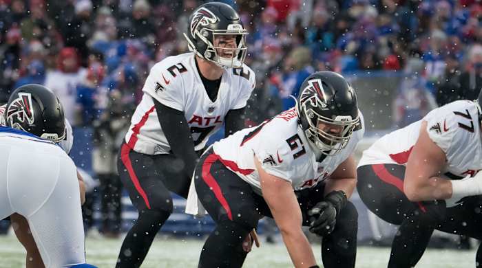 Atlanta Falcons quarterback Matt Ryan (2) and center Matt Hennessy (61) at the line of scrimmage in the fourth quarter against the Buffalo Bills at Highmark Stadium.