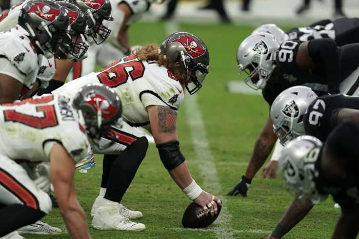 Oct 25, 2020; Paradise, Nevada, USA; A general view of the line of scrimmage as Tampa Bay Buccaneers center Ryan Jensen (66) snaps the ball against the Las Vegas Raiders at Allegiant Stadium. The Buccaneers defeated the Raiders 45-20.