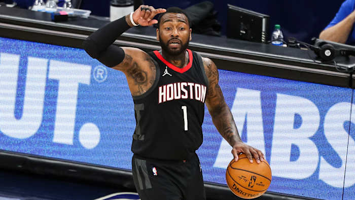 Houston Rockets guard John Wall (1) controls the ball in the third quarter against the Minnesota Timberwolves