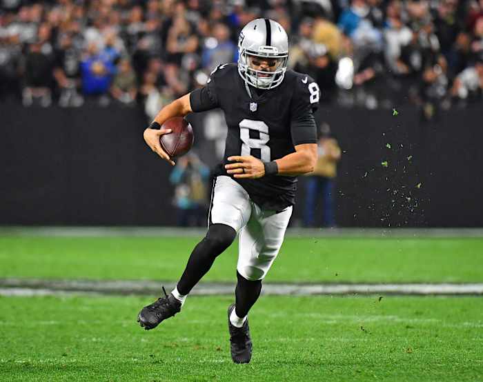 Jan 9, 2022; Paradise, Nevada, USA; Las Vegas Raiders quarterback Marcus Mariota (8) rushes with the ball during the fourth quarter against the Los Angeles Chargers at Allegiant Stadium. Mandatory Credit: Stephen R. Sylvanie-USA TODAY Sports