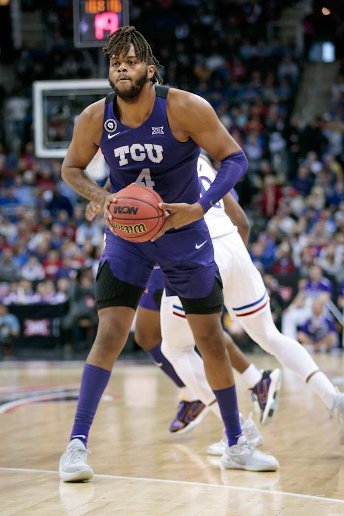 Mar 11, 2022; Kansas City, MO, USA; TCU Horned Frogs center Eddie Lampkin (4) looks to pass during the first half against the Kansas Jayhawks at T-Mobile Center. Mandatory Credit: William Purnell-USA TODAY Sports